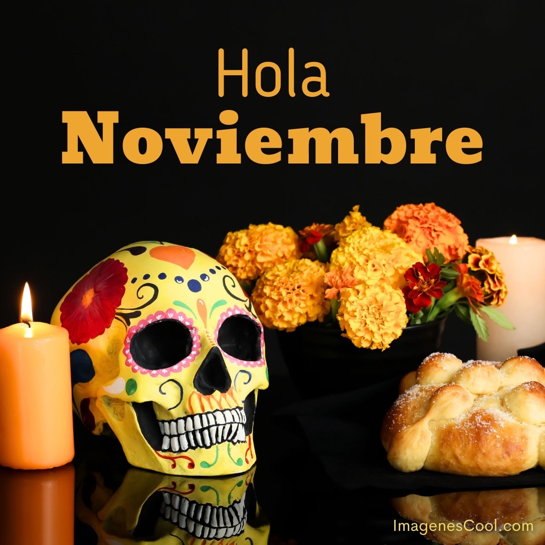 Una calavera colorida, velas, flores y pan de muerto con el texto 'Hola Noviembre'
